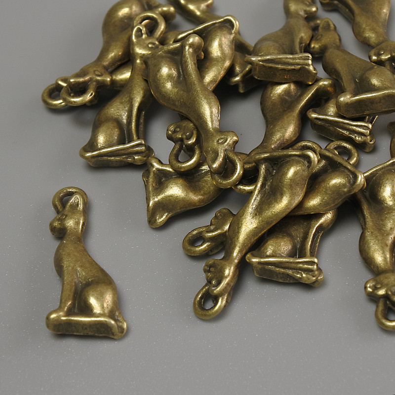 Kitten Sphinx Pendant Findings Bronze Color, 20×8×3 mm± hole, diameter 1.2 mm± packaging 20 g (~18 pcs)