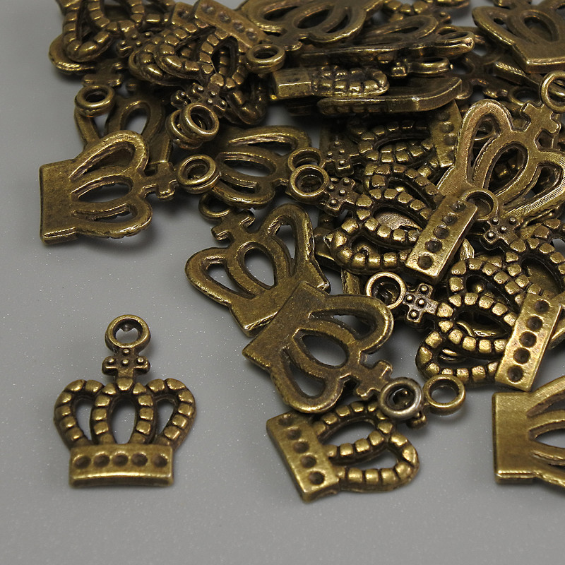 Pendant Crown Bronze Tone, brass bronze color, dimensions 15x10x1 mm±, hole diameter 2 mm±, packaging 20 g (~36 pcs)