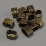 Row Spacer with Bronze Tone Insert, hole diameter 13x9mm±, insert diameter 11x7mm±, packaging 20 g (~13 pcs)