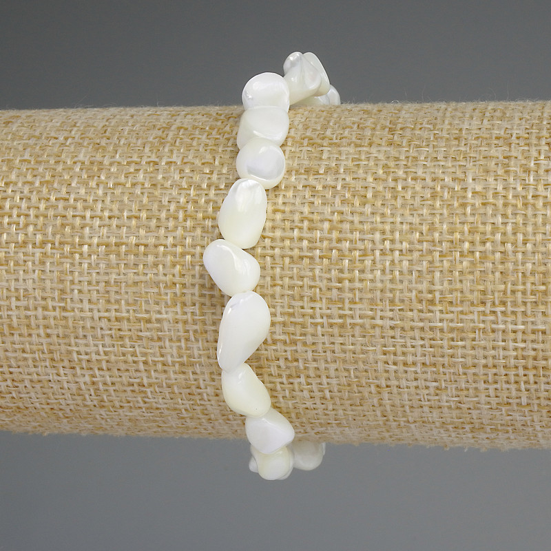 Bracelet Pearlized shell faceted, diameter 8x6-8mm+-, length 18cm stretch