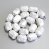 Howlite Beads, Faceted, diameter 18–21×14–16 mm± on thread, length 38 cm+