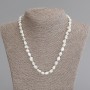 Necklace made of mother-of-pearl faceted, diameter 7-9x6-7mm +-, length 50cm +- with clasp