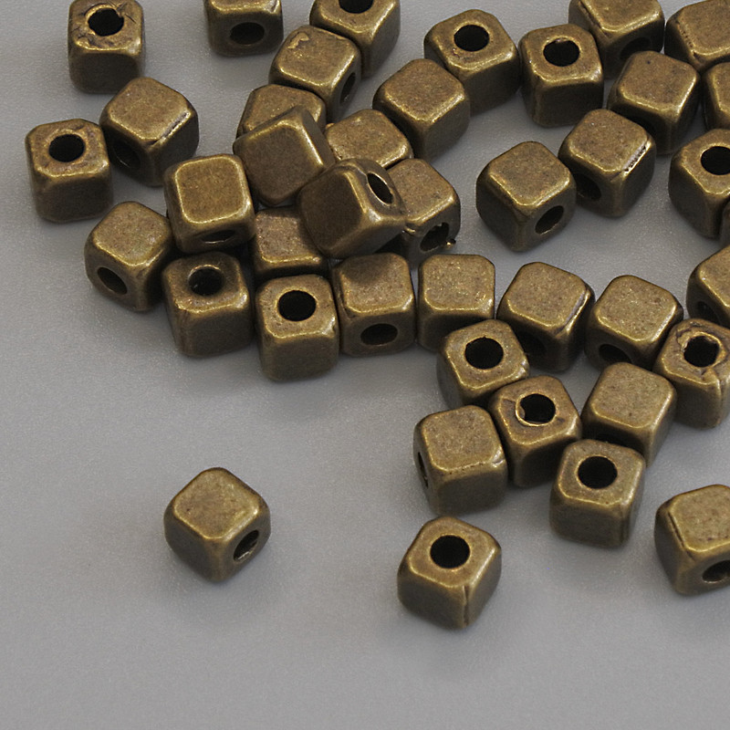 Bead findings insert color metal bronze, diameter 4x4 mm ± hole, diameter 2 mm ± packaged 42 pcs
