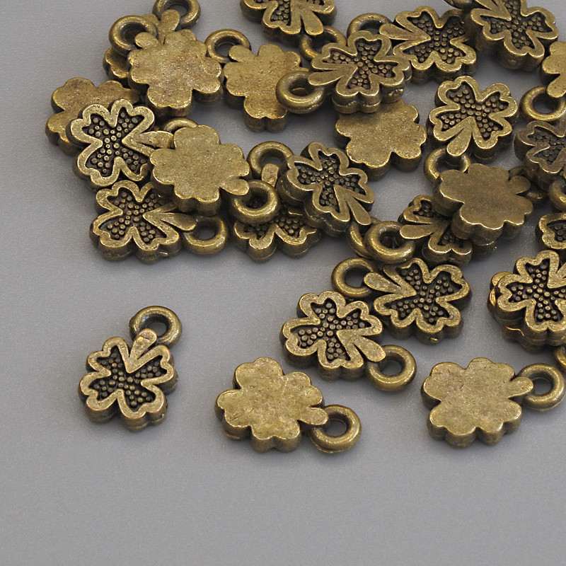 Pendant Charm Shamrock in Bronze Metal Color, 10×6 mm diameter ± packaging 26 pcs