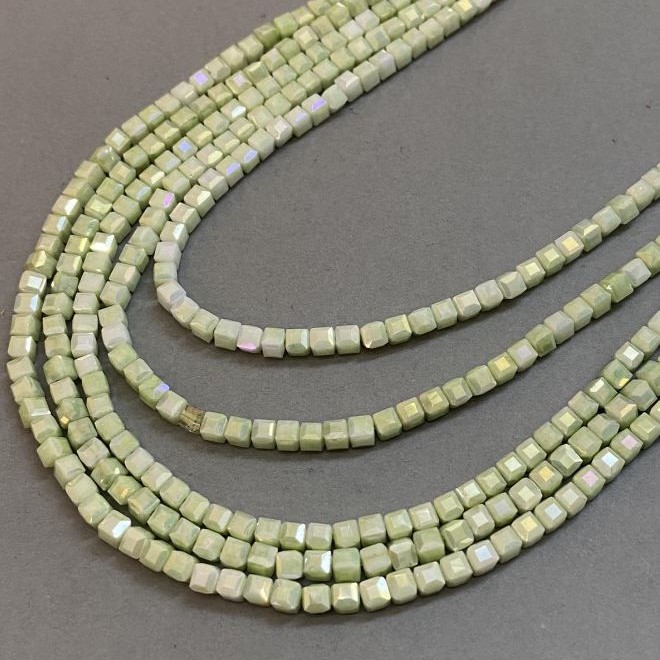 Beads Czech Crystals Green with Gas Deposition on Thread Grenaded Cube, 4x4mm, 38cm length