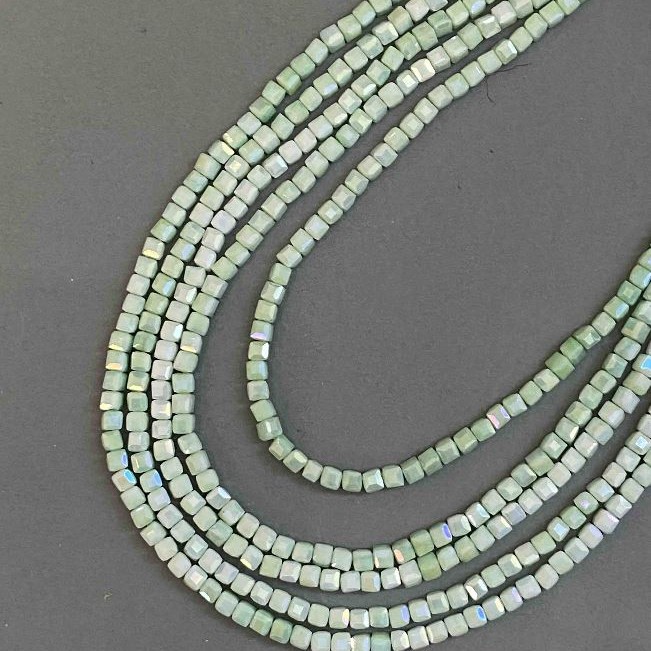 Beads Czech Crystal Salad Green with gasoline coating drilled on thread faceted cube, diameter 4x4mm + -, length 38cm +