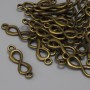 Infinity Connector Bronze Color 20x6mm+- pack of 29