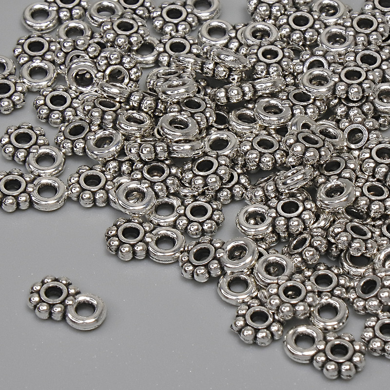 Pendant in silver color, diameter 7×4.5 mm ± hole 1.5 mm, packaging 84 pcs+