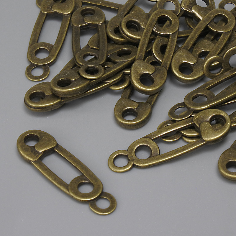 Pendant Charm Clip Color Bronze, diameter 23×7 mm± hole in ear 2.2 mm± packaging 22 pcs