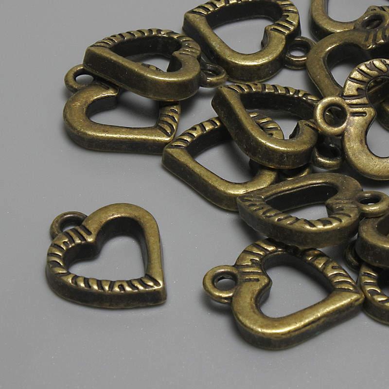 Heart Pendant in Bronze Color 15×12 mm ± drilled hole 2.3 mm ± packaging 15 pcs