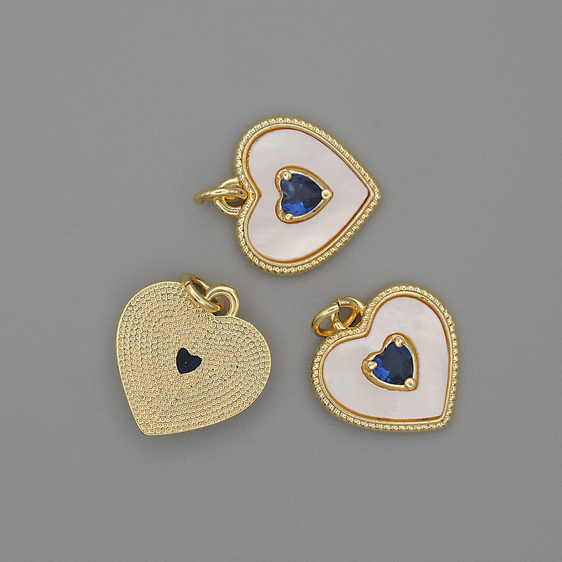 Pendant Mother-of-P pearl Heart 15x15mm+- blue crystal, length 18mm+- gold metal