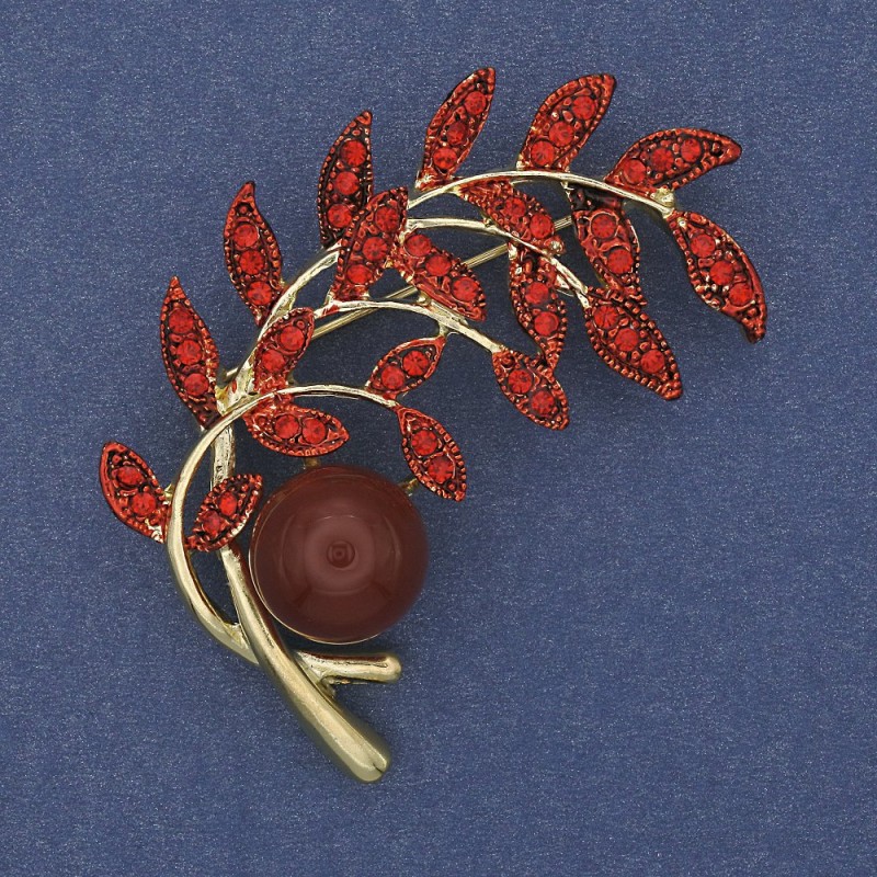 Brooch 'Twig' with carnelian and red crystals, golden metal 54x46mm +