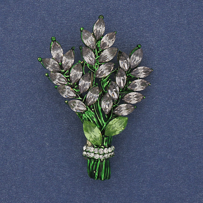 Brooch Sprig with pale violet and white rhinestones on golden metal 43x29mm +