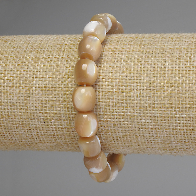 Bracelet with Mother-of-Pearl Barilo beads, diameter 10x9.5 mm, 5 mm+-, elastic length 18 cm