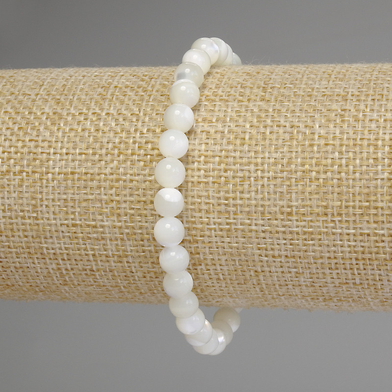 Bracelet Mother-of-P pearl smooth bead, 6mm diameter ±, length 18cm stretch