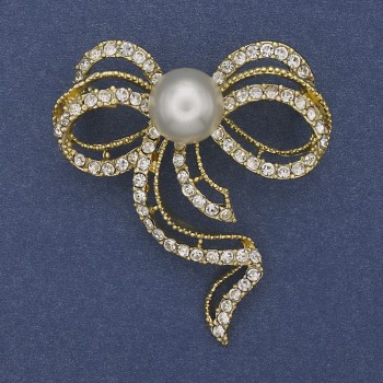 Brooch 'Bow Pearl' with white crystals on golden metal 43x50mm+