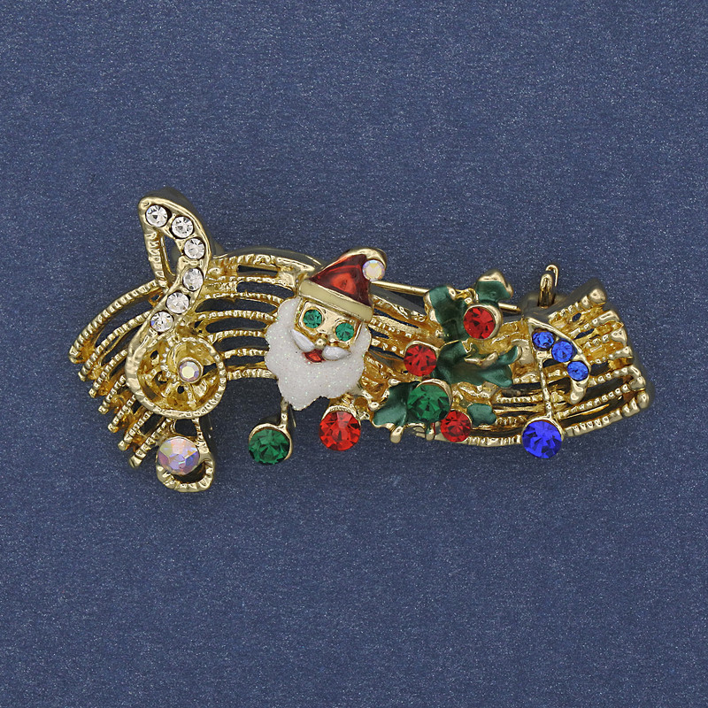 Brooch 'New Year Melody' red green white enamel with crystals golden metal 23×43mm +