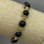 Shungite Bracelet Smooth Bead, 8mm diameter ± with metal inserts, 18cm length ± stretch