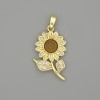 Pendant Sunflower, golden metal with white rhinestones, diameter 30×17mm+