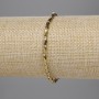 Bracelet with Czech crystal, golden, faceted cylinder 5x3mm±, bead 2mm±, length 18cm stretch
