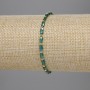 Bracelet Czech crystal green faceted cylinder 5×3mm+- bead 2mm+-, length 18cm stretch