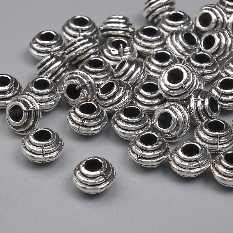 Bead findings inlay bead color metal silver, diameter 6x4.5 mm ± hole diameter 2.5 mm ± packaging 20 g (~42 pcs)