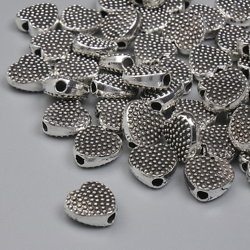 Bead finding insert heart shape, metal color silver, diameter 7mm±, hole diameter 1.3mm±, packaging 20g (~40 pcs)
