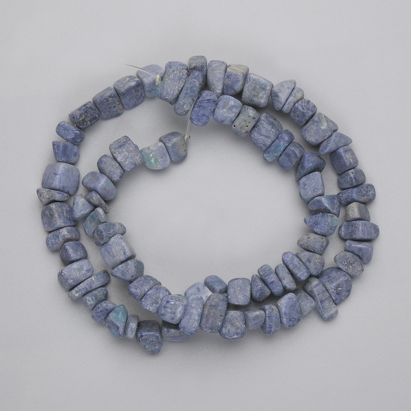 Porous coral beads chipping, diameter 7-10×3, 5-6, 5 mm+-, length 40 cm+-, on fishing line