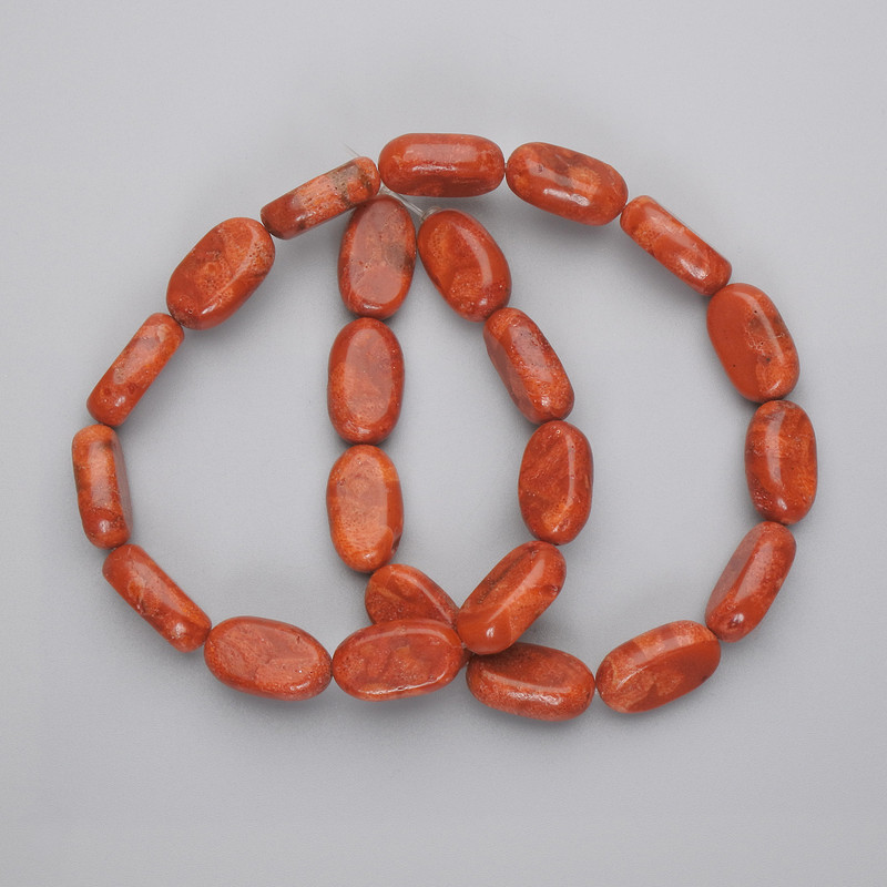 Hollow coral beads oval, diameter 18×11mm± on thread, length 42cm+