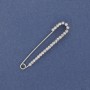 Brooch pin with white rhinestones 56x11mm+- silver metal