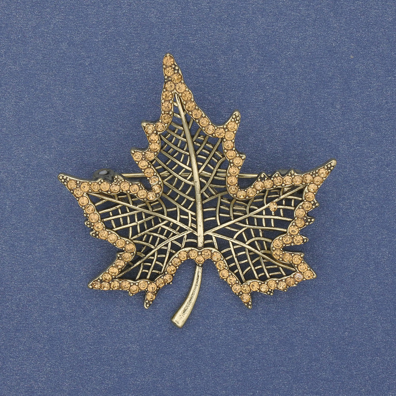Pin 'Cloven Leaf' bronze with rhinestones, brown colors, gold-toned metal 45x44mm+