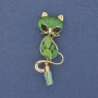 Brooch pendant Cat with a pea green Cat's Eye in golden metal 43x17mm+