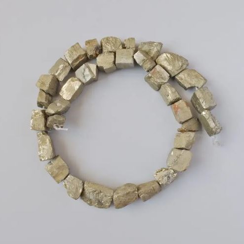 Pyrite natural stone faceted unpolished beads, diameter 10-16×8-10 mm + -, length 38 cm + - on thread