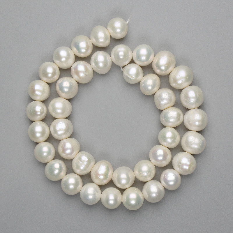 Natural freshwater pearl beads on a thread 10.5–11 x 9–9.5 mm, 38 cm long