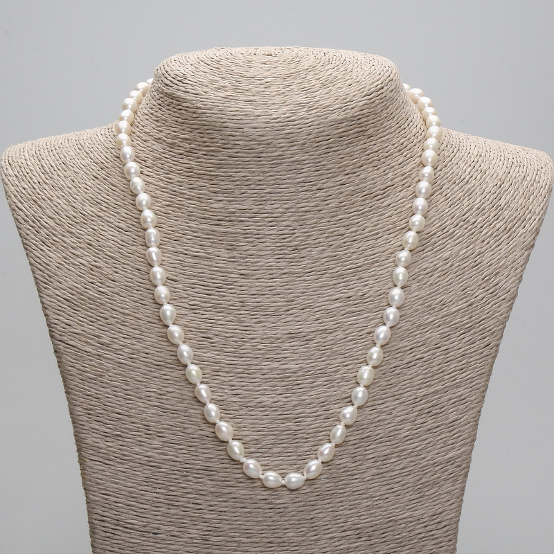 Necklace of natural freshwater pearls 7.5-8×6mm, length 45 in. +/- 1.97 in. extender chain
