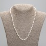 Necklace of natural freshwater pearls 7.5-8×6mm, length 45 in. +/- 1.97 in. extender chain