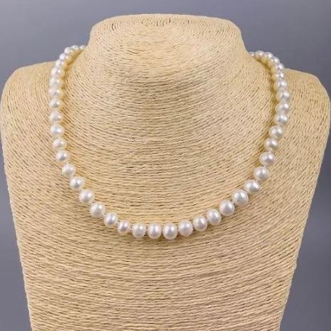 Necklace of freshwater rounds 8-9x7 mm, length 45 cm, with clasp