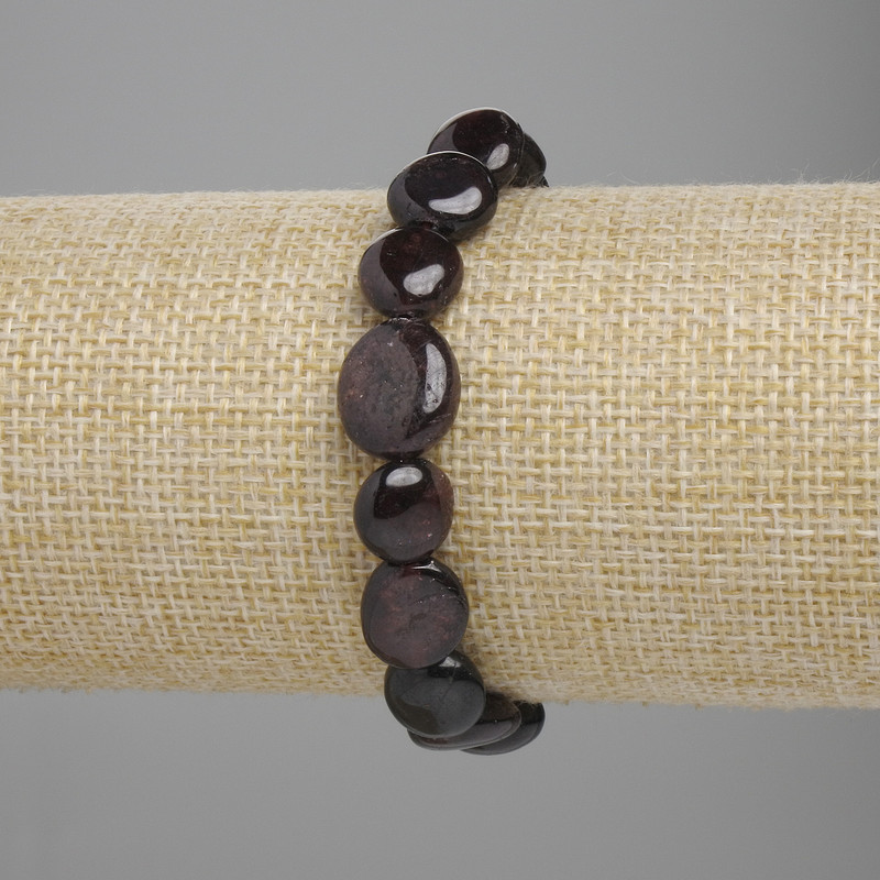 Garnet bracelet, tumbled, diameter 10-14x10-12mm +/-, length 18cm +/- stretch