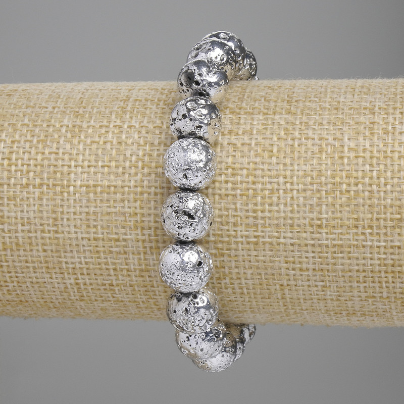 Lava bracelet with a silvery metal coating, porous bead 10.5 mm +- , length 18 cm +- stretch
