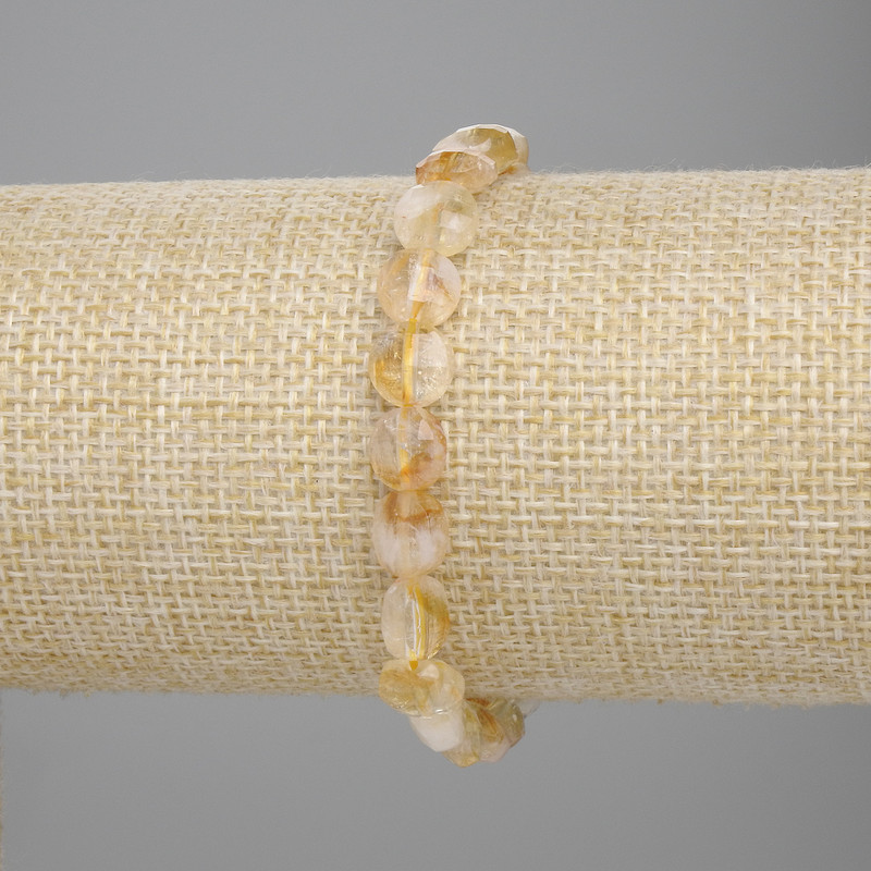 Citrine bracelet faceted coin shape, diameter 8mm+-, length 18cm+- stretch