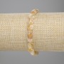 Citrine bracelet faceted coin shape, diameter 8mm+-, length 18cm+- stretch