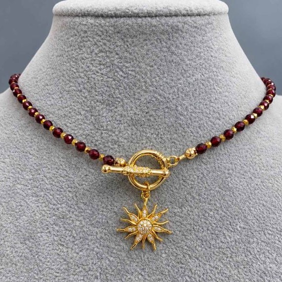 Choker Garnet faceted bead 4mm+- Hematite bead 2mm+- with pendant Sun 20mm+-, length 37cm+- and toggle clasp
