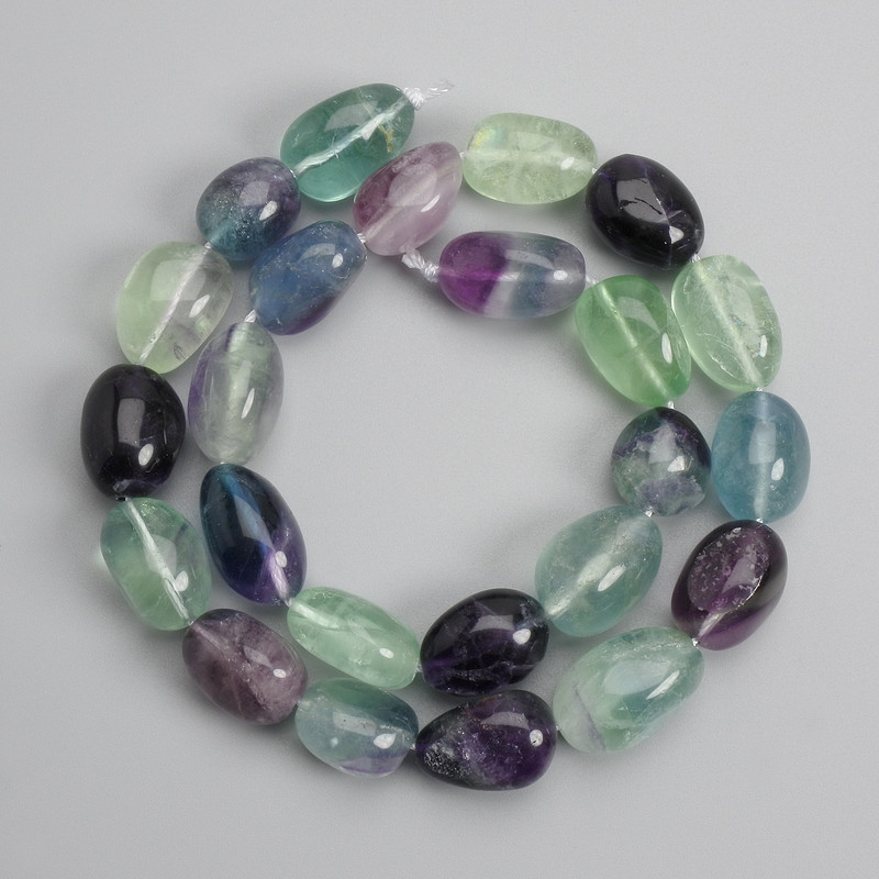 Fluorite beads tumbled 13-19x11-13mm ±, length 40cm ± on a thread