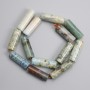 Stone beads fossilized coral cylinder 29-30x10-10, 5mm+-, length 38cm+- on a string