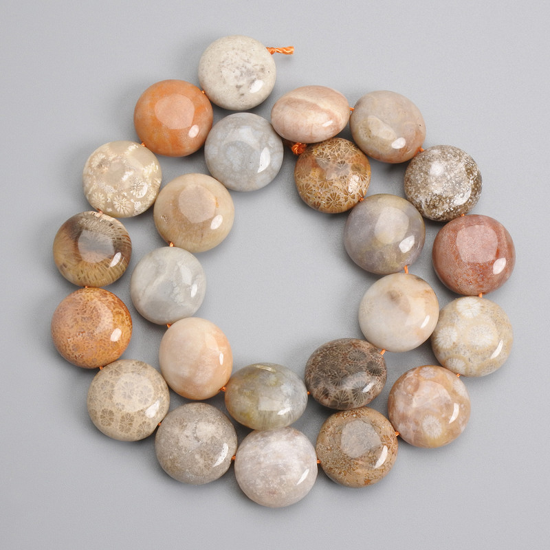 Fossilized Coral beads coin 16.5-17x9mm+-, length 38cm+- on a string