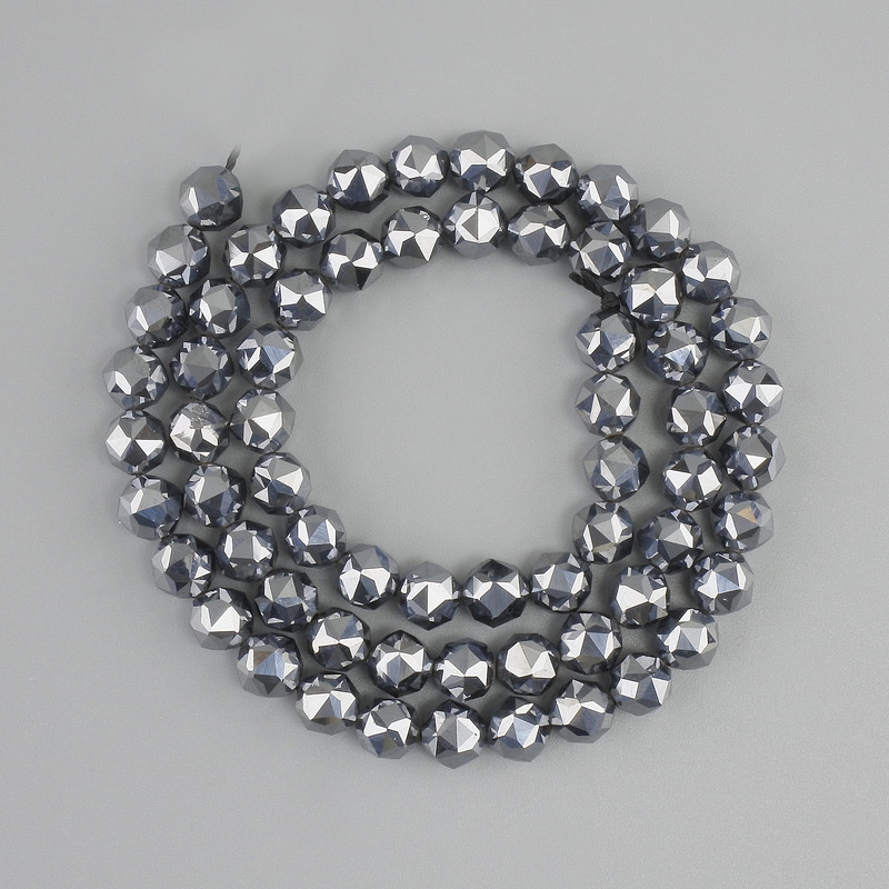 Terahertz beads faceted, diameter 6mm+- , length 39cm+- on a thread