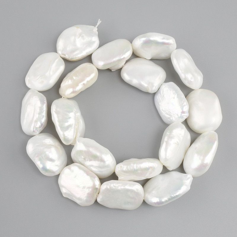 Baroque pearls with a "gasoline" iridescent tint, flat 18-21x14-15x mm +/-, length 37 cm+