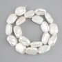 Baroque pearls with a "gasoline" iridescent tint, flat 18-21x14-15x mm +/-, length 37 cm+