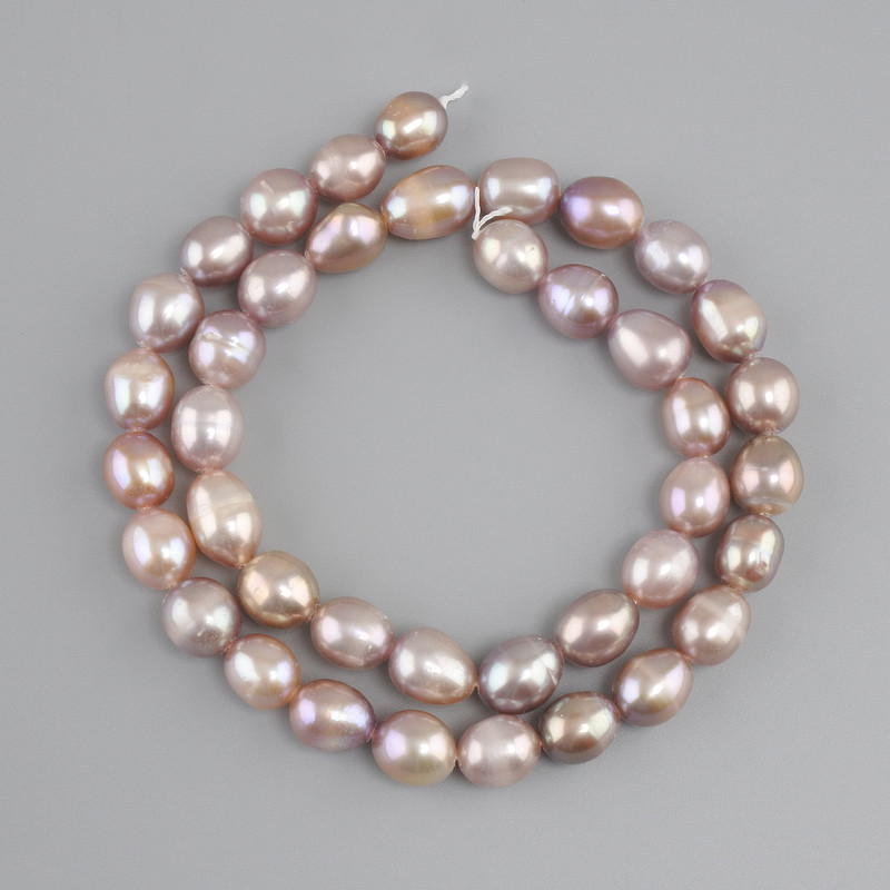 Oval freshwater pearls in pastel shades, diameter 9–10x7.8 mm, 8mm+-, length 37 cm +- on a string