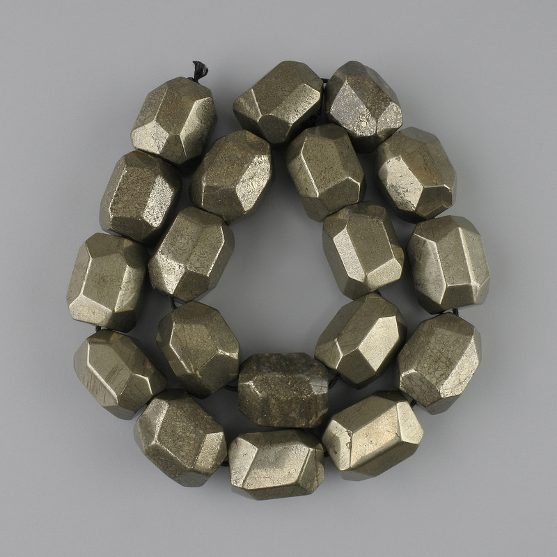 Pyrite beads facets 20-21×15-17 mm +- , length 39 cm +- on a thread